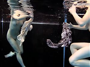two chicks swim and get nude handsome